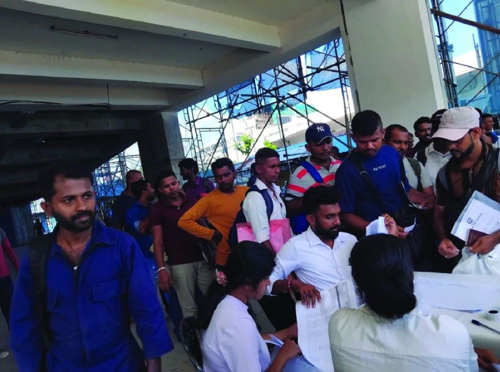 Candidates registering at a selection programme